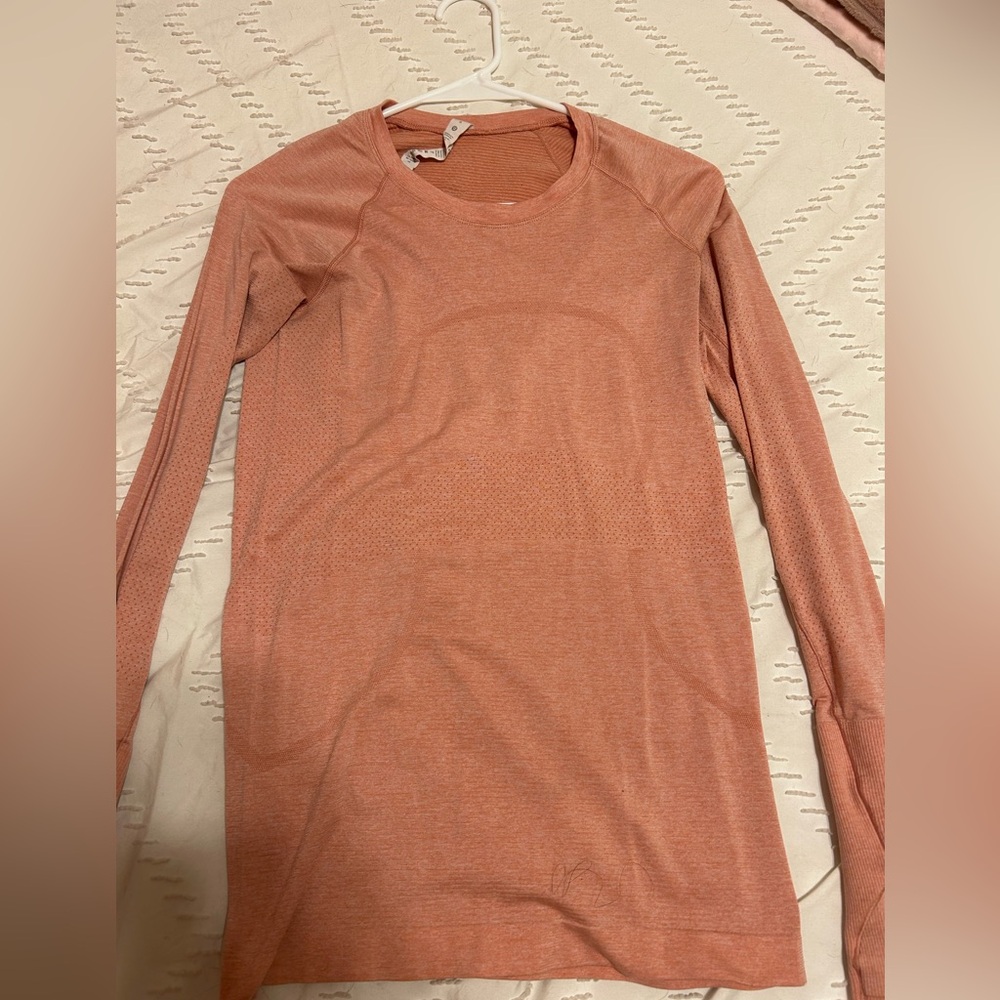 Lululemon long sleeve swiftly tech. Size 6. Only worn a handful times.